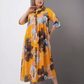Robe longue ample imprimée boutonnée à revers pour femme